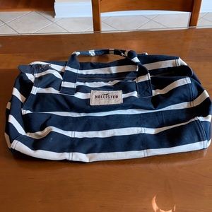 Hollister medium sized duffle bag. approximately 18 inches long and 10 in. high.